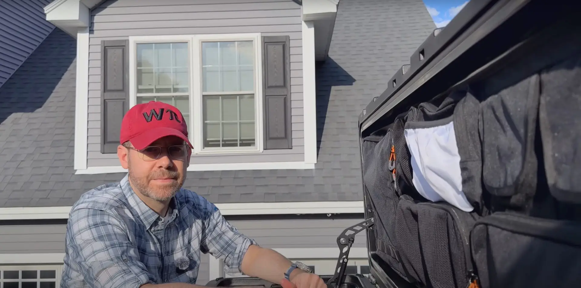 ROAM Box 128-liter roof storage container with organized lid featuring mesh pockets and cable management for van life storage solutions